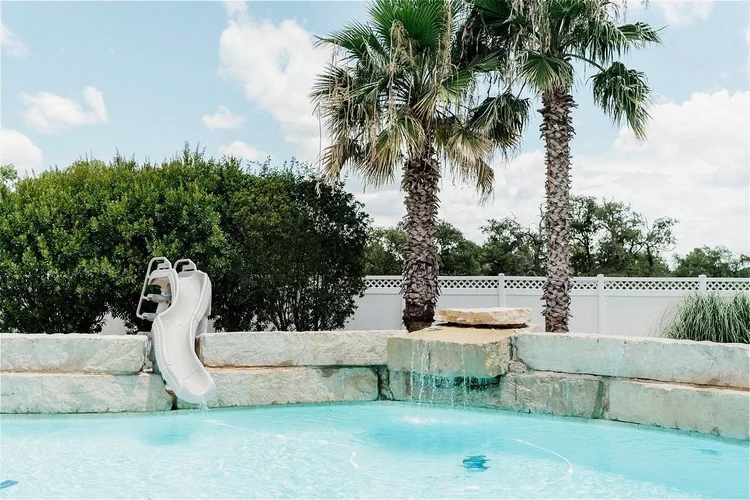 Back lawn and pool