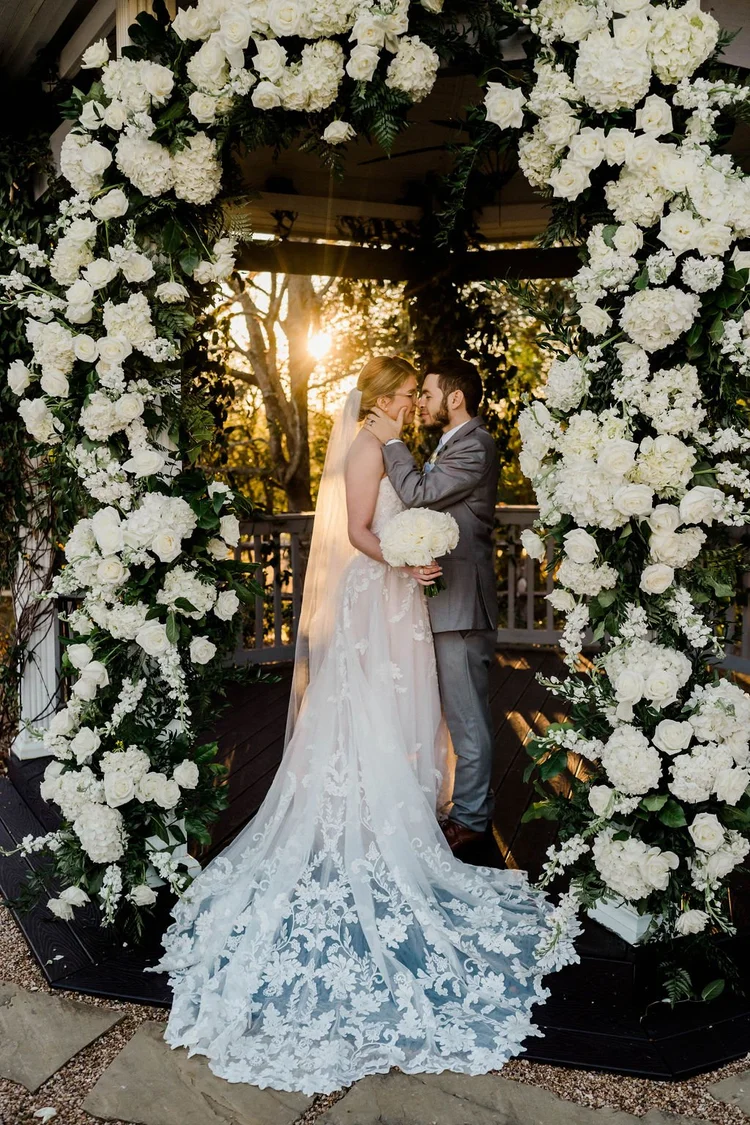 Bride and groom sunset portraits at Bryan TX wedding venue